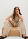 Mango - light beige Pleated flowy trousers Mango - light beige Pleated flowy trousers