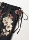 Mango - light beige Flowy printed trousers Mango - light beige Flowy printed trousers
