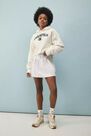 Urban Outfitters - Creme Champion UO Exclusive Logo Patch Hoodie Urban Outfitters - Creme Champion UO Exclusive Logo Patch Hoodie