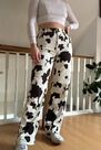 Urban Outfitters - Black Motif BDG Cow Print Juno Jeans Urban Outfitters - Black Motif BDG Cow Print Juno Jeans