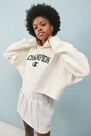 Urban Outfitters - Creme Champion UO Exclusive Logo Patch Hoodie Urban Outfitters - Creme Champion UO Exclusive Logo Patch Hoodie