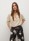 Mango - light beige Flowy printed trousers Mango - light beige Flowy printed trousers