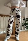 Urban Outfitters - Black Motif BDG Cow Print Juno Jeans Urban Outfitters - Black Motif BDG Cow Print Juno Jeans