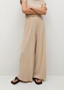 Mango - light beige Pleated flowy trousers Mango - light beige Pleated flowy trousers