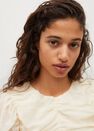 Mango - natural white Short-sleeved t-shirt with ruffles Mango - natural white Short-sleeved t-shirt with ruffles
