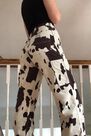 Urban Outfitters - Black Motif BDG Cow Print Juno Jeans Urban Outfitters - Black Motif BDG Cow Print Juno Jeans